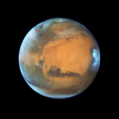 Imagen de Marte del 12 de mayo de 2016 tomada con el telescopio espacial Hubble de la NASA cuando el planeta estaba a 80 millones de kilómetros de la Tierra, solo unos días antes de su oposición del 22 de mayo.